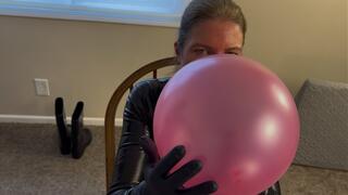 Catsuit Looner Blows up Balloons