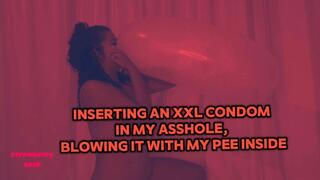 Inserting an XXl condom in my asshole, blowing with my pee