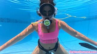 Carissa in pink top, black lace panties and high heels playing with the ice cream stimulator!