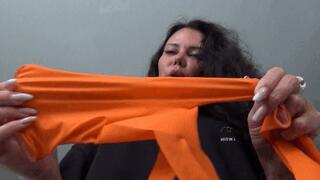 I squeeze your throat with orange rubber gloves b