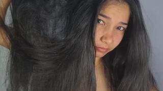 Stretching My Hair and Letting You Watch”