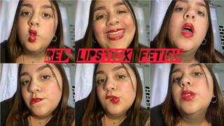 Painting my lips red while drinking mate