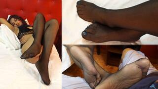 Alexandra lustful teases and rubs in lingerie and black stockings