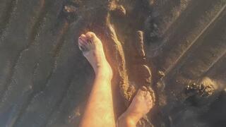 Getting my feet dirty in the wet sand
