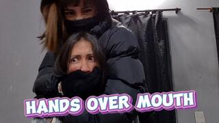 Hands over mouth, subduing my best friend