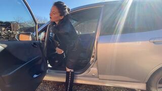 lady in black suede boots pedal pumping and smoking in the car