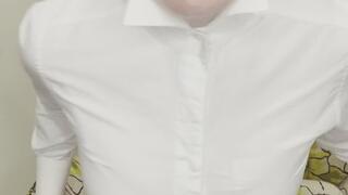 Woman removing pantyhose, shirt, and tie