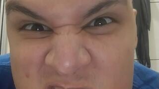 Making silly scary faces on the toilet