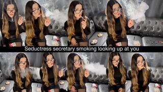 Seductress secretary smoking marlboro red 100s looking up at you