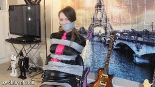 REMASTERED IN HD AND 60 FPS! Chrissy Marie is a music manager humiliated in bondage and wraparound tape gagged by the artist she refused to manage