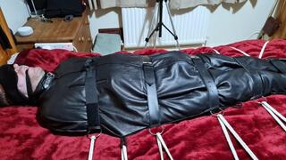 Handjob on man in sleepsack by woman 2-BBW domination,BBW bondage,man in bondage,male bondage,man tied up,leather sleepsack,sleep sack,amateur, bound and gagged man,bed bound,handjob,pre cum,edging,edged,