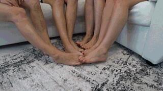4 gerls crossed legs and interlocking their toes together fs