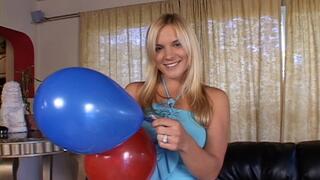 Beautiful blonde enjoys her balloons for her party