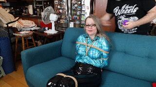 The bondage nightmare of Summer! Wearing a shiny aqua blue blouse, Summer gets tied by the burglar, tightly wraparound gagged and unable to move an inch!