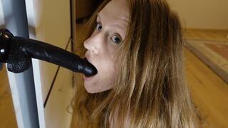 Black dildo sucking blowjob