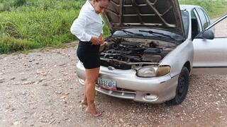 Woman pumps car pedals with high heels after repairing it (3)