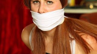 Defiant Lilian Tightly Taped Up, Panty Gagged, Massively Triple Gagged & Humiliated by her Stalker in: STALKED! RE EDIT 2024