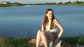 Sophie Sits On Her Slave By The Lake