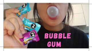 I chew and make balloons with my chewing gum