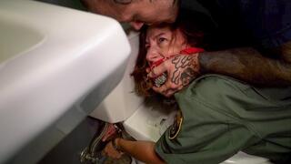 Changing of the Guard - Elise Graves and Heavy - Overpowered by an inmate, Officer Graves is gagged and bound in a humiliating position