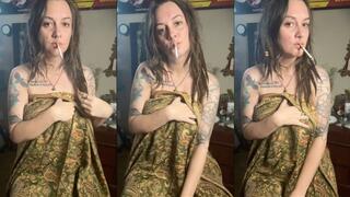 Smoking wearing only a pashmina