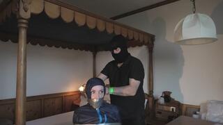 Rachel Adams bound, pantygagged and pantyhooded in shiny nylon Rainwear