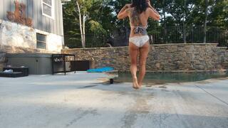 sexy smoking milf by pool