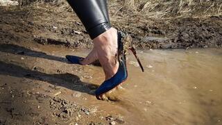 Louboutin in deep and slippery mud, high heels in puddles, heels wrecked, high heels stuck