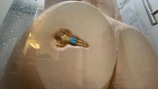 Unaware Giantess has a tiny in the shower makes him her loofah