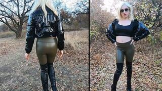 Mistress Katya walking in her shiny leather outfit