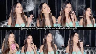Applying my new Lancôme lip balm and smoking Marlboro gold