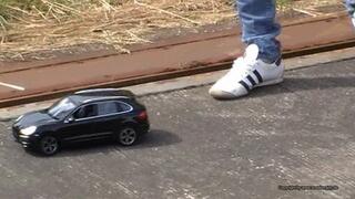 toy car crush in adidas aditrack white sneakers