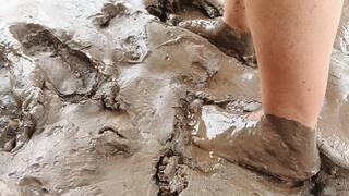 Walking through a lot of mud with their bare feet (3)