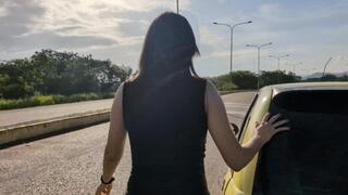 Katherine driving and pedal pumping on sexy yellow heels and black minidress