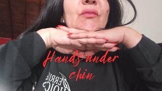 Hands under chin