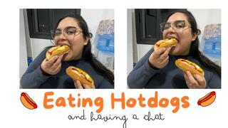 Eating hot dogs and having a chat