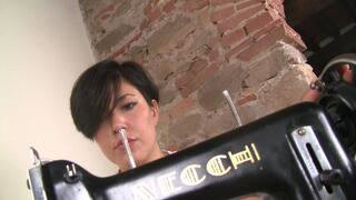 Alessia working on the sewing machine (480p)