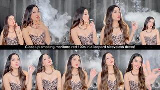 Close up smoking marlboro red 100s in a leopard sleeveless dress!