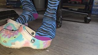 Croc and sock play while working