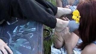 Two foot slaves in the park