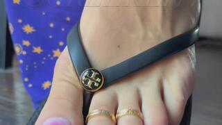 Black flip flop tapping pink yellow French pedicure