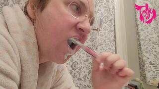 Tooth brushing and tongue scrubbing from profile view