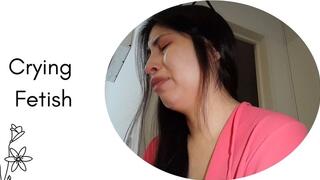 Crying, I listen to my saddest song