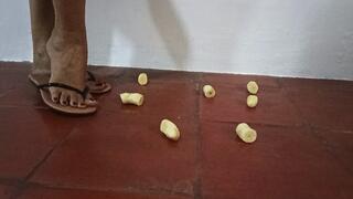 She uses her flip-flops to crush and trample with great gusto(3)