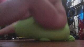 Naked jumping on inflatable Dino hopper