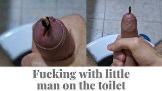 Fucking with little man on the toilet
