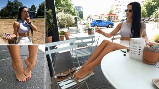 Jade smoking in summer cafe and playing with her bare feet