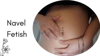 I play with my deep navel and fill it with saliva