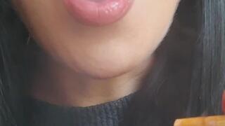 Smoking close up with lipstick application