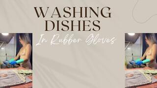 washing dishes in rubber glove